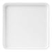 A white square plate with a raised rim.