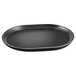 A black oval shaped tray with raised rims.