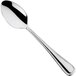 A Sola the Netherlands stainless steel dessert spoon with a long handle.