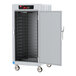 A white metal Metro C5 8 Series heated holding cabinet with solid doors open.