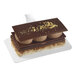 A white rectangular Solia bagasse display with chocolate and peanut butter desserts on top.