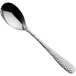 A Sola stainless steel dessert spoon with a handle.