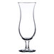 A close-up of a clear Libbey Cyclone Hurricane Glass with a stem.