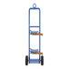 A blue Vestil hand truck with two wheels.