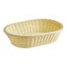 An oblong white woven plastic rattan basket.