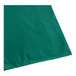 A green plastic Trinity Plastics trash can liner bag on a white background.