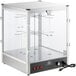 A glass and metal countertop display warmer with a glass door.