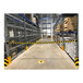 A warehouse with a yellow and black warning tape.