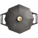 A black metal FINEX cast iron skillet with gold handles and cover.