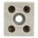 A white square terminal block with four holes.