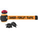 An orange and black Banner Stakes wall mount barrier with a red light on top.