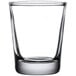 A clear Libbey shot glass on a white background.