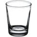 A clear Libbey shot glass on a white background.