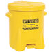 A yellow Eagle Manufacturing hands-free oily waste can with a black and yellow label.