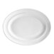 A white Tuxton oval china platter with a thin curved rim.