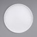 A white round melamine tray with a pattern on the surface.