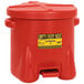 A red Eagle Manufacturing 10 gallon oily waste can with a yellow label.