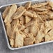 A tray of Daring Foods vegan plant-based chicken strips on a table.