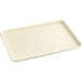 A white rectangular Baker's Mark tray with a wire rim handle.