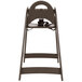 A brown Koala Kare high chair with a black seat strap.