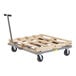 A Little Giant pallet dolly with a T-handle and wheels carrying a wooden pallet.