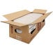 A white plastic container of G.S. Gelato Nutella Gelato on a cardboard box with a lid.