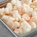 A tray of frozen U/2 oz. slipper lobster tail meat.