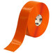 A roll of orange Mighty Line safety tape with a white stripe.