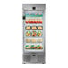 A FoodSpot fresh food vending machine with food on shelves behind a clear glass door.