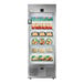 A silver FoodSpot smart fridge full of food on shelves.