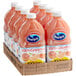 A cardboard box of Ocean Spray grapefruit juice bottles.