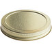 A close up of a gold metal 89/400 lid with a metal rim.