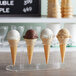 Three JOY #1 pointed bottom ice cream cones displayed in a clear plastic holder.