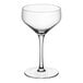 An Acopa Silhouette coupe glass with a stem on a white background.