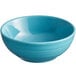 A close-up of a Caribbean turquoise Acopa Capri stoneware nappie bowl with a rim.