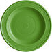 A close-up of a Acopa Capri palm green stoneware plate with a spiral pattern.