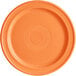 An Acopa Capri Valencia Orange stoneware plate with a circular pattern.