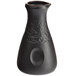 An Acopa Heika black stoneware sake bottle with a round neck and textured matte finish.