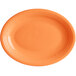 An orange oval Acopa Capri stoneware platter.