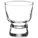 An Acopa Select clear glass sake sample with a short rim.