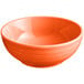 An Acopa Capri stoneware bistro bowl with an orange exterior on a white background.