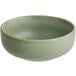 A sage green Acopa Pangea nappie bowl with a white rim.