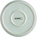 A close up of an Acopa Pangea Harbor Blue Matte coupe porcelain plate.
