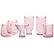 A group of Acopa Pangea mauve stemless wine glasses.