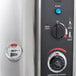 A close-up of the temperature gauge on a Cecilware Twin Automatic Coffee Urn.