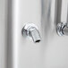 A Cecilware stainless steel automatic coffee urn with two faucets.
