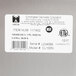 A Cecilware label on a silver coffee urn.