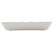 A white rectangular melamine tray with a scalloped edge.