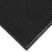 A close-up of a WaterHog Charcoal mat with a square pattern and black rubber border.