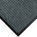 A WaterHog Classic bluestone carpet mat with a black rubber border.
